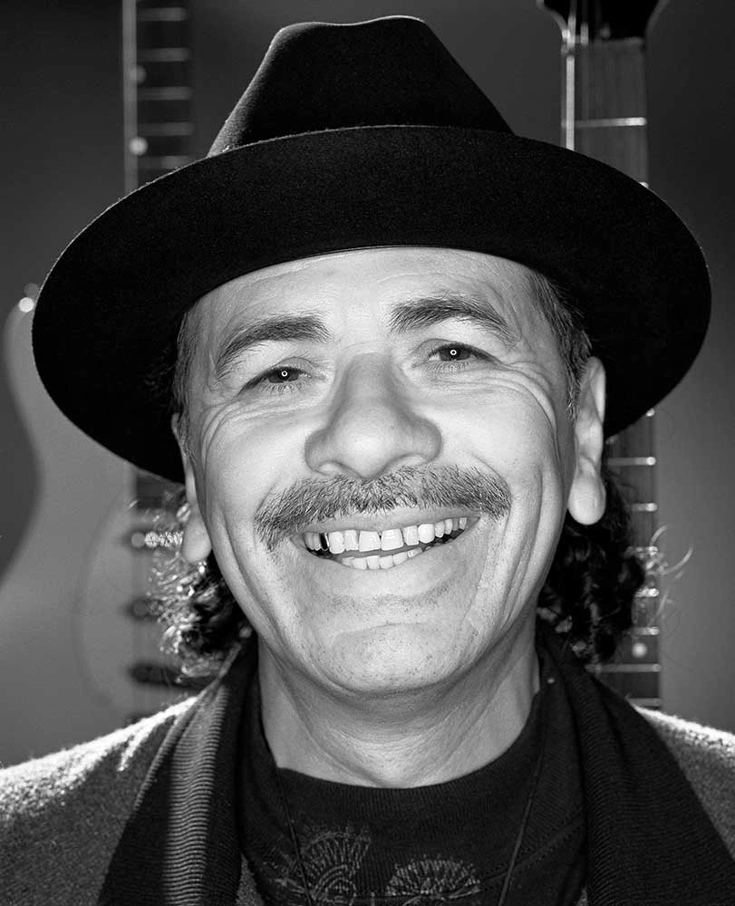 Black and white personal branding portrait of musician Carlos Santana smiling – Personal Branding Portrait Photographer Copenhagen