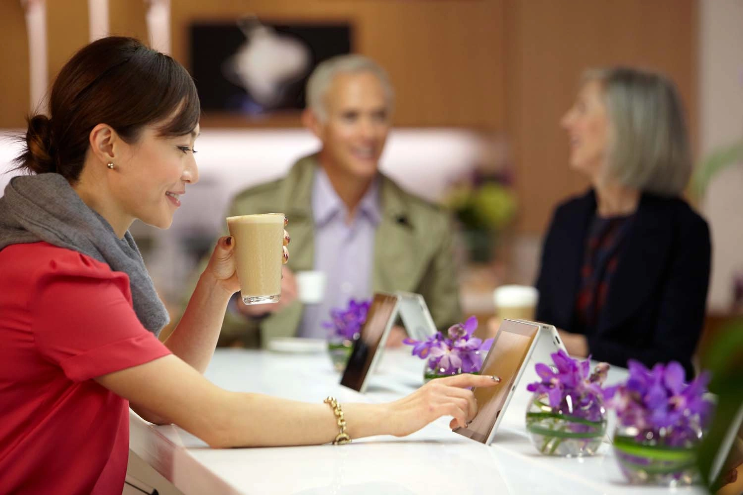 Personal branding portrait of a digital consultant using a tablet in a Copenhagen office